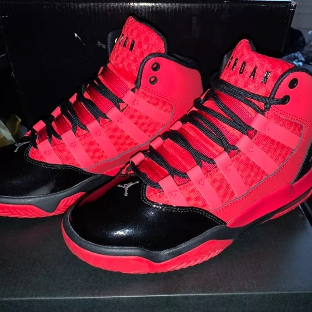 Jordans max aura red and black.